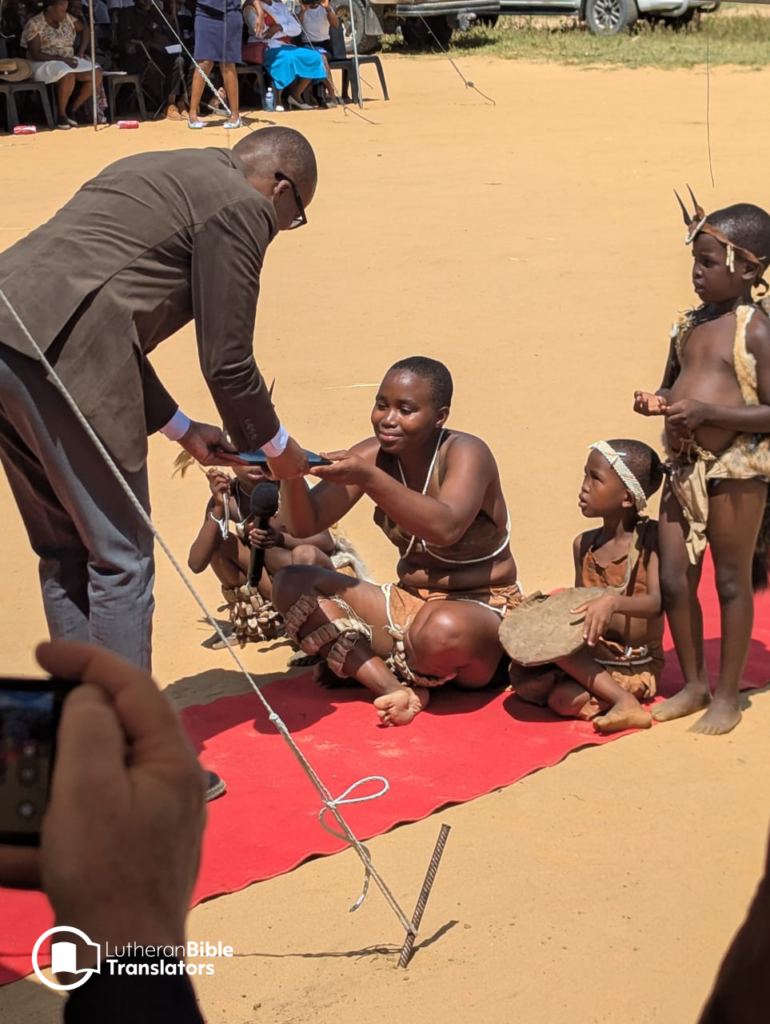 Vice President of Botswana Ndaba Gaolathe receives a copy of the Khwedam Panoramic Bible.