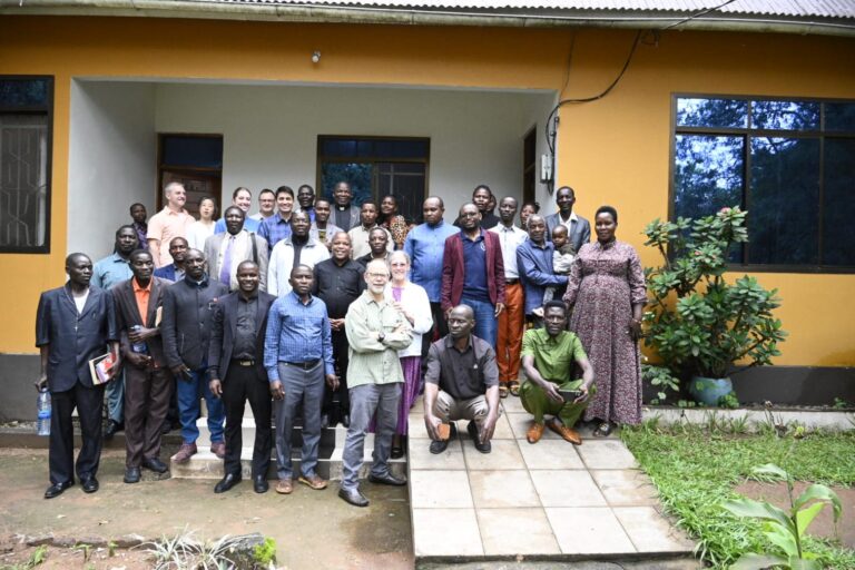 Participants representing the Kara, Sumbwa, and Taturu languages gather for a group picture during the Oral Bible Storytelling workshhop.